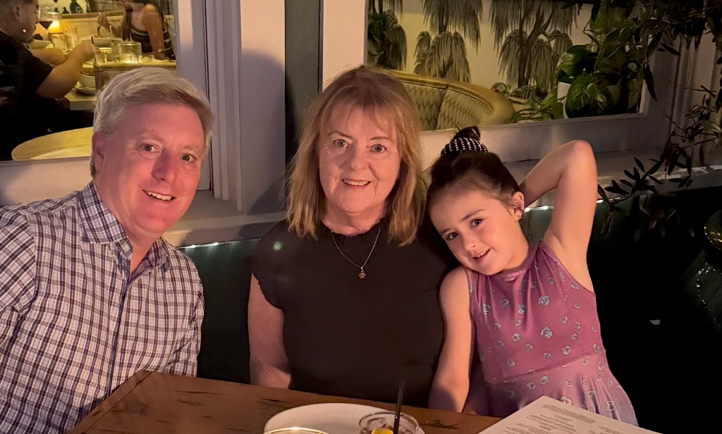 Virginia Smith, center, at dinner